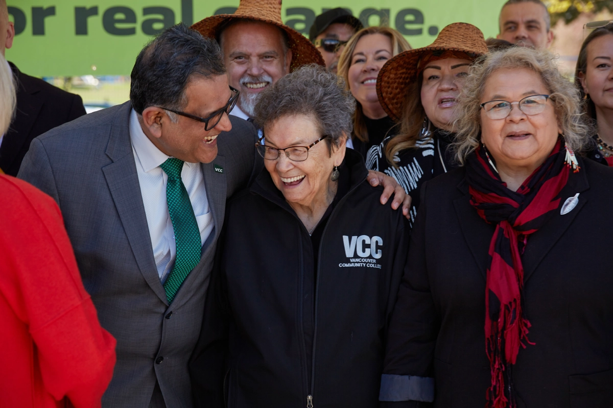 Candid photograph of VIP guests laughing at Vancouver corporate event