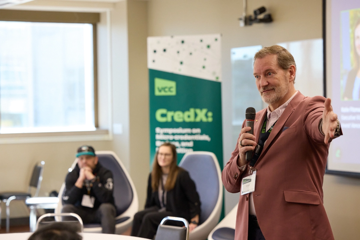 Vancouver corporate event photograph of conference panel and speaker
