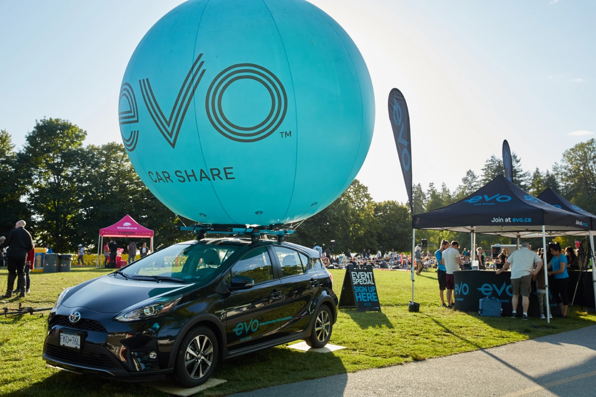 professional event photograph showcasing branding in carshare event in a Vancouver park