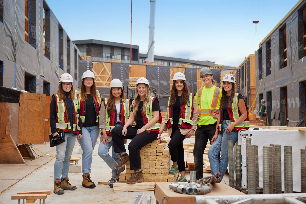 Professional group photograph of 7 women at a construction site in Vancouver